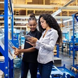 Two women working