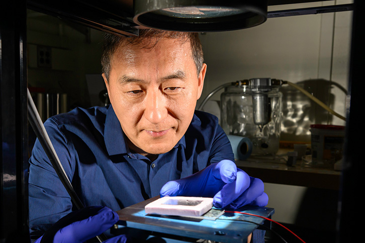 Chunlei Guo tests his group’s solar thermoelectric generator
