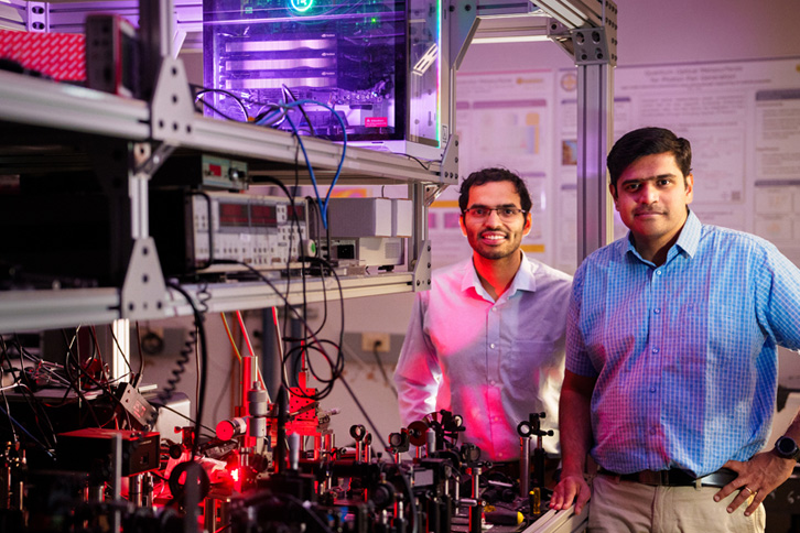 Sandia National Laboratories scientists Saaketh Desai, left, and Prasad Iyer