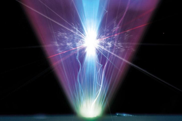 combination photograph and artist's impression shows the creation of an exceptionally intense reflected beam via a coherent harmonic focus