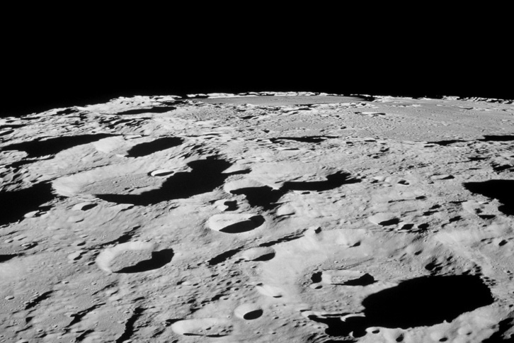 Dark craters on the moon’s surface