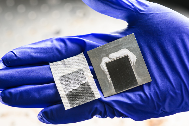  solar-powered desalination device featuring laser-etched super-wicking black metal (right), existing solar desalination systems (left)