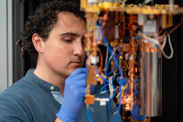 researcher with quantum computer